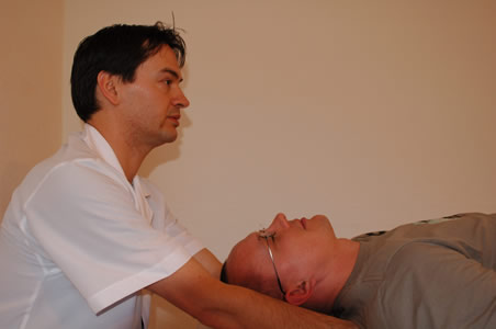 Marcos performing a polarity therapy as part of a client treatment</perch:content>