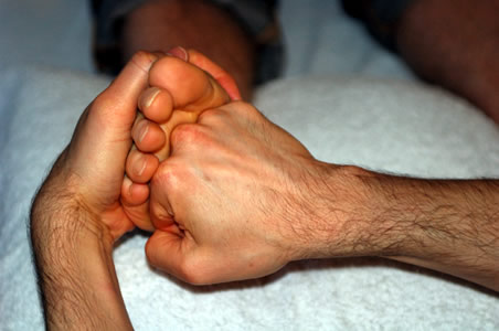 Marcos performing Reflexology