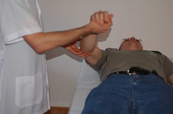 Marcos performing a Polarity therapy technique as part of a client treatment